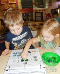 Letter Search and Match Alphabet and Literacy Activity. Learn letters, phonics, and matching with this fun literacy center activity. Great for preschool, kindergarten, and early education! #letteractivity #alphabetactivity #literacycenter