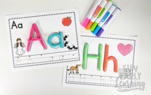 Play Dough Letter Fun Literacy Activity! Fun hands-on activity for kid's learning letter recognition, letter identification, letter-sounds, phonics and writing! Perfect for preschool, kindergarten and early childhood. #literacycenter #phonics #handwriting
