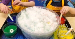 Watercolor Snow Painting! Fun and easy art project and sensory bin for kids. Learn how easy it is to make this kids craft! Great activity for preschool and kindergarten. #kidscraft #sensorybin #funearlylearning