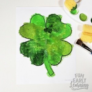 Shamrock Painting St. Patrick's Day craft! Fun and easy kid's craft with free shamrock template. Just print and create!  #stpatricksday #kidscraft #funearlylearning